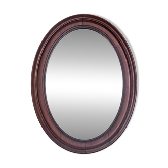 Oval mirror in a mahogany frame, Northern Europe, late 19th century.