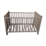 Crib with adjustable height