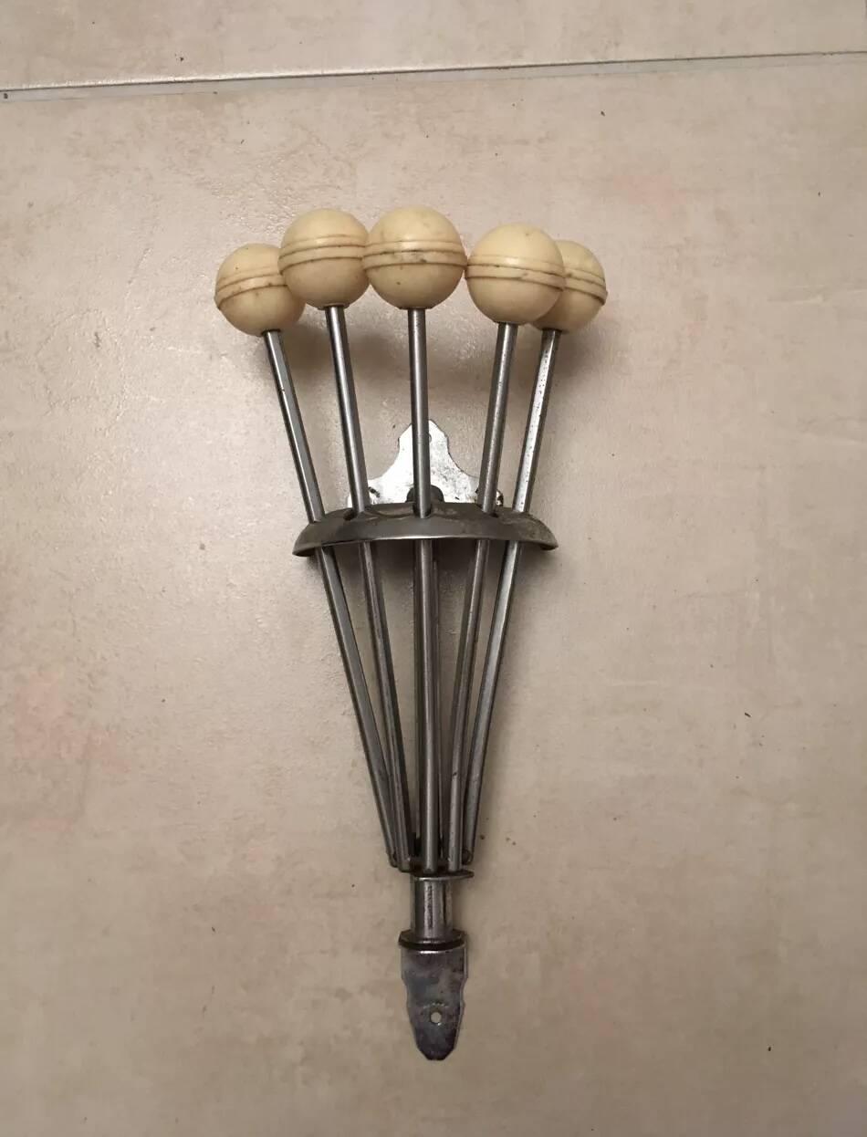 Vintage Serjac folding coat rack.