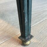 Patinated and gilded steel coffee table in the style of Jacques Quinet.