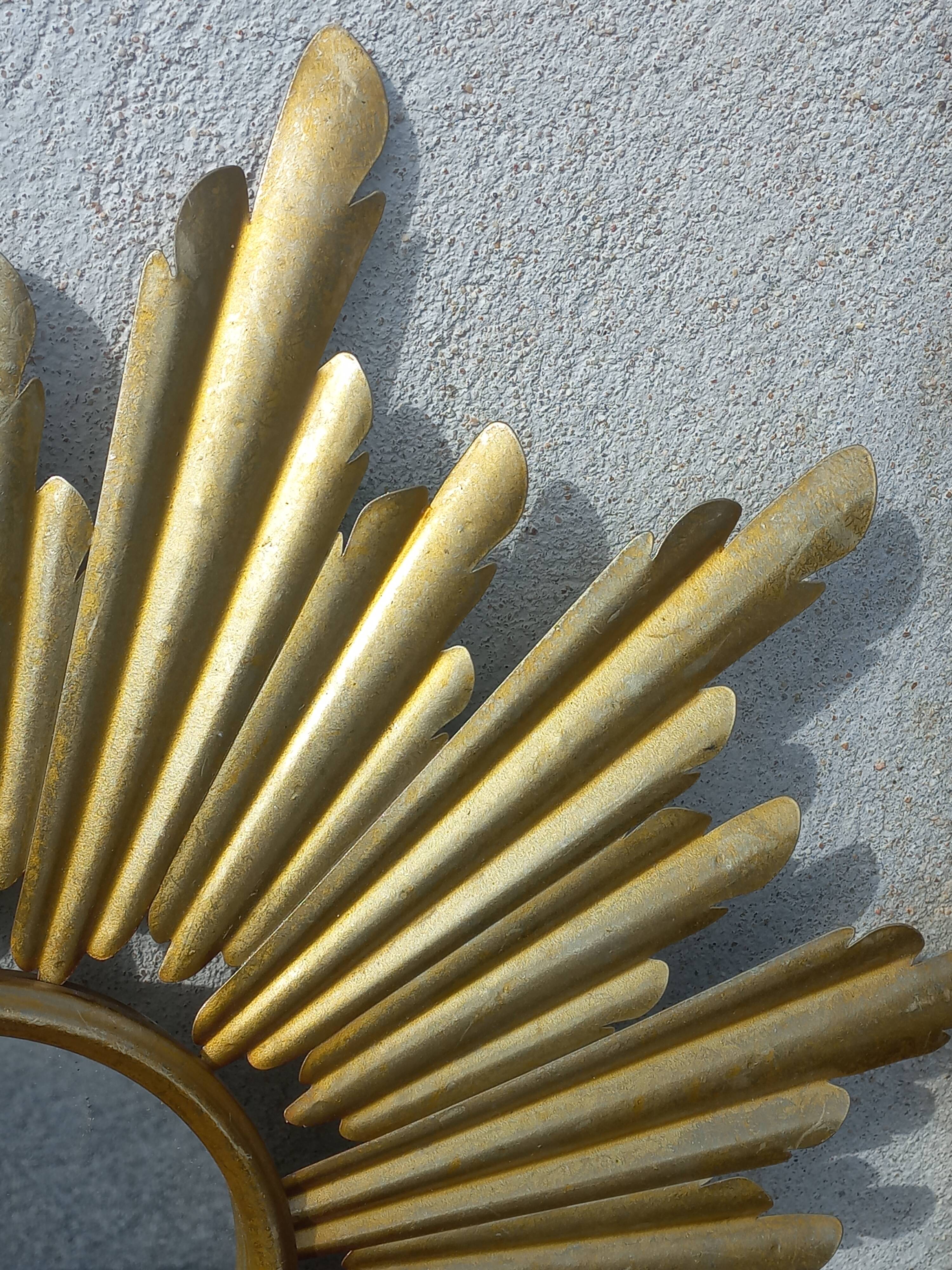 Gold metal sun mirror
