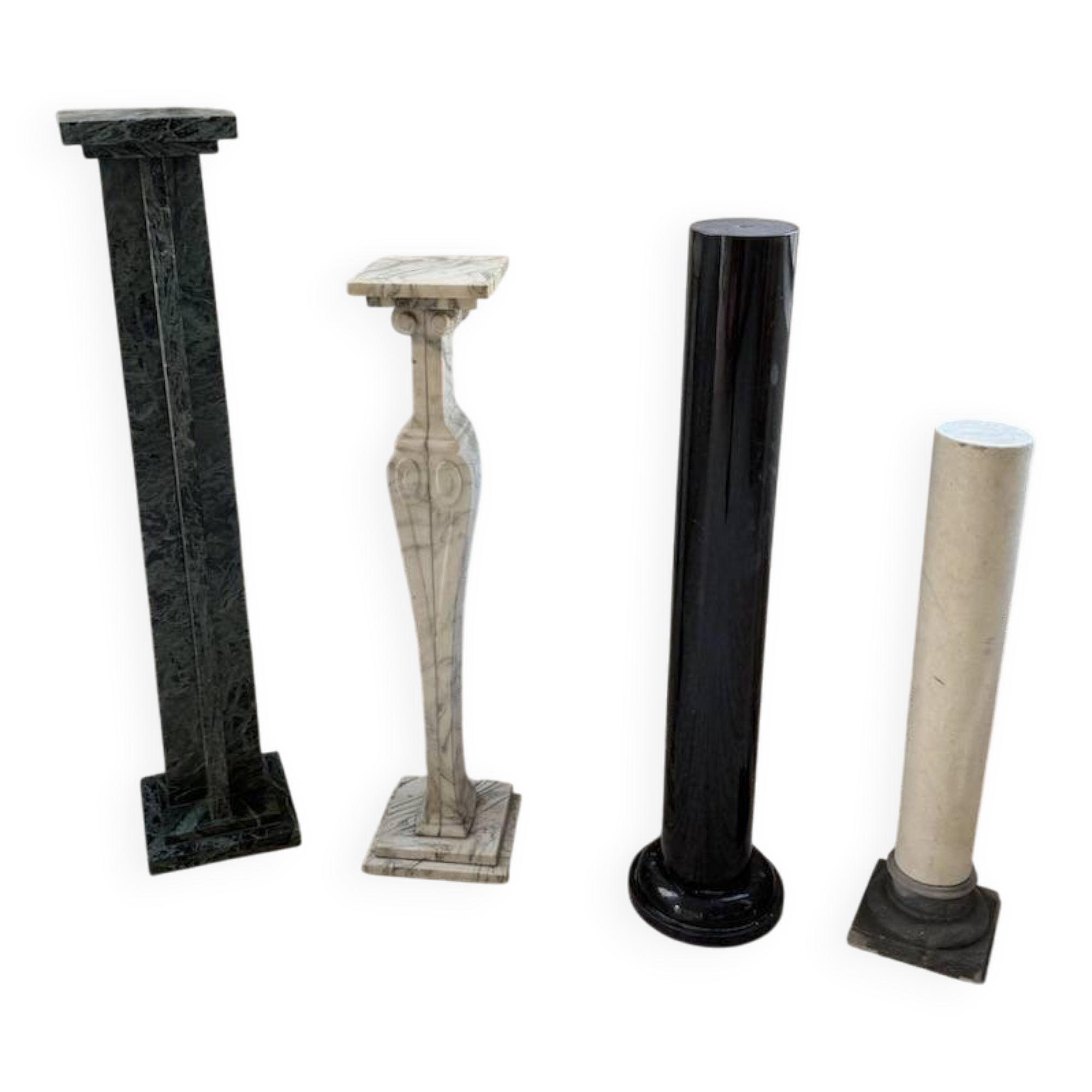 Set of 4 marble columns or pedestals.