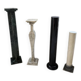 Set of 4 marble columns or pedestals.