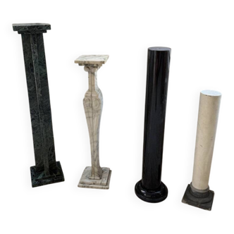 Set of 4 marble columns or pedestals.