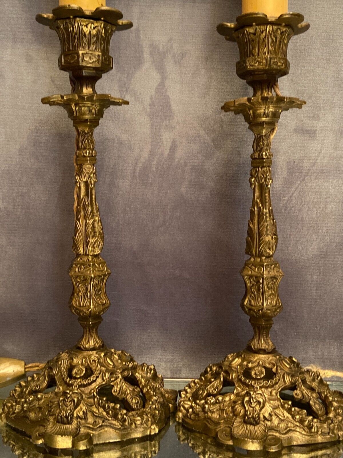 Pair of candlesticks mounted in late nineteenth century bronze lamp base Renaissance style