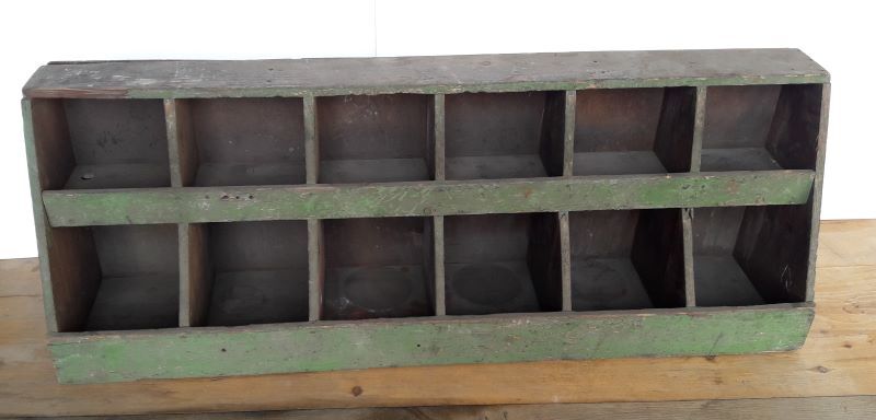 Locker, old workshop shelf in wooden compartments