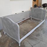 Artisanal double cannage bed, bench, pearl gray patina.