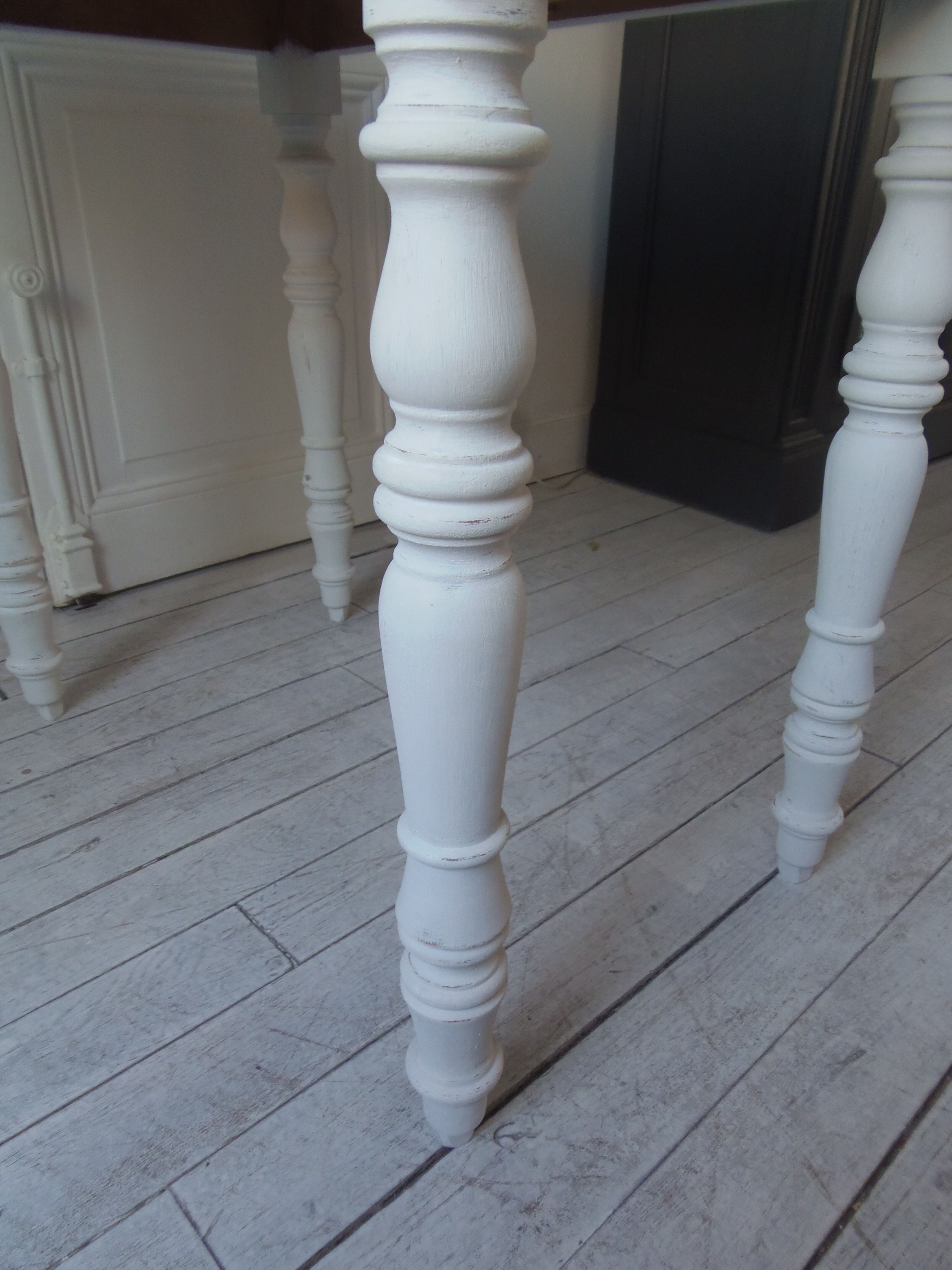 Oval table with beaded grey patinated flaps, wooden tray