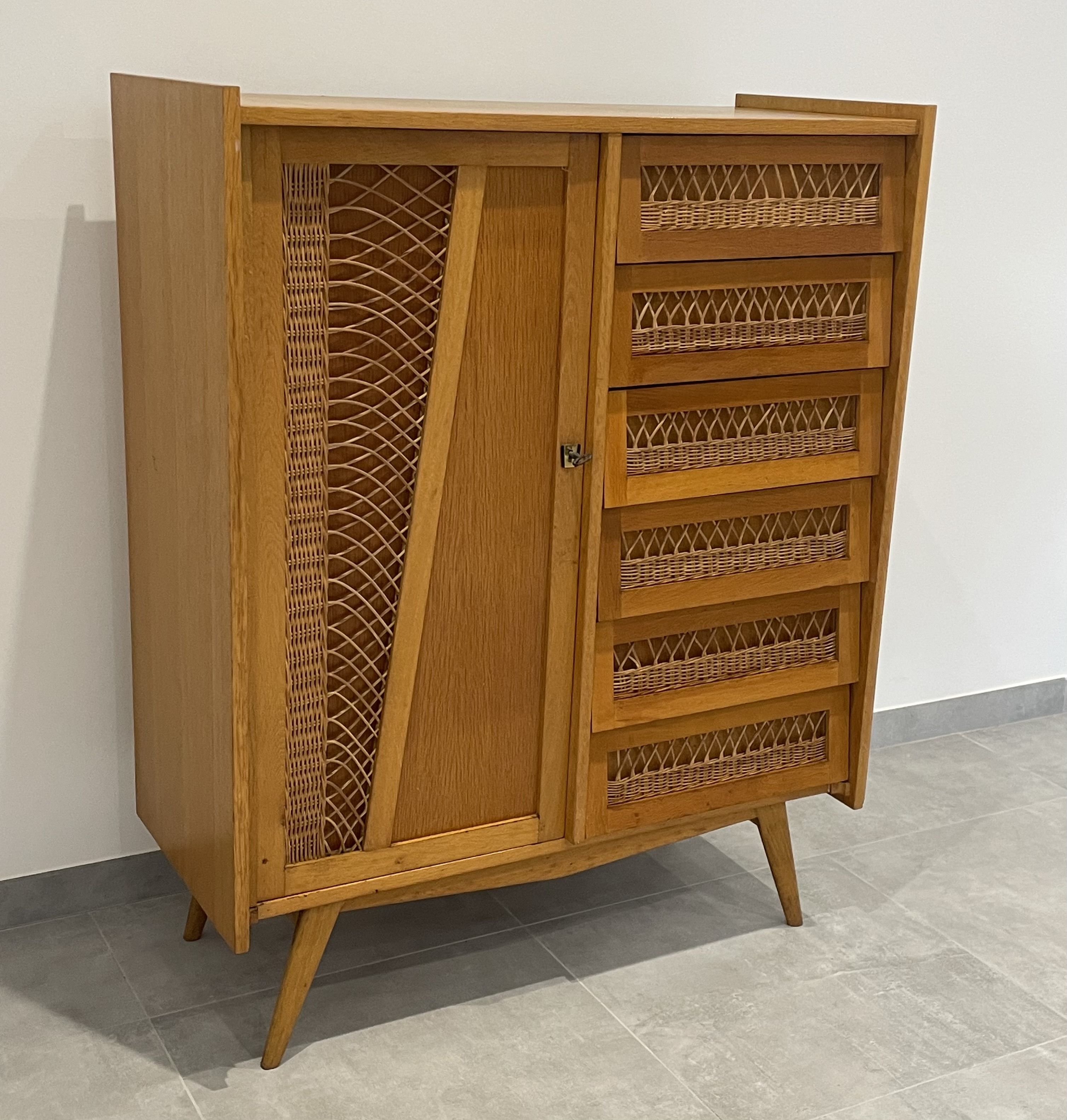 Children's wardrobe in wood and rattan with so-called Parisian compass feet