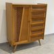 Children's wardrobe in wood and rattan with so-called Parisian compass feet