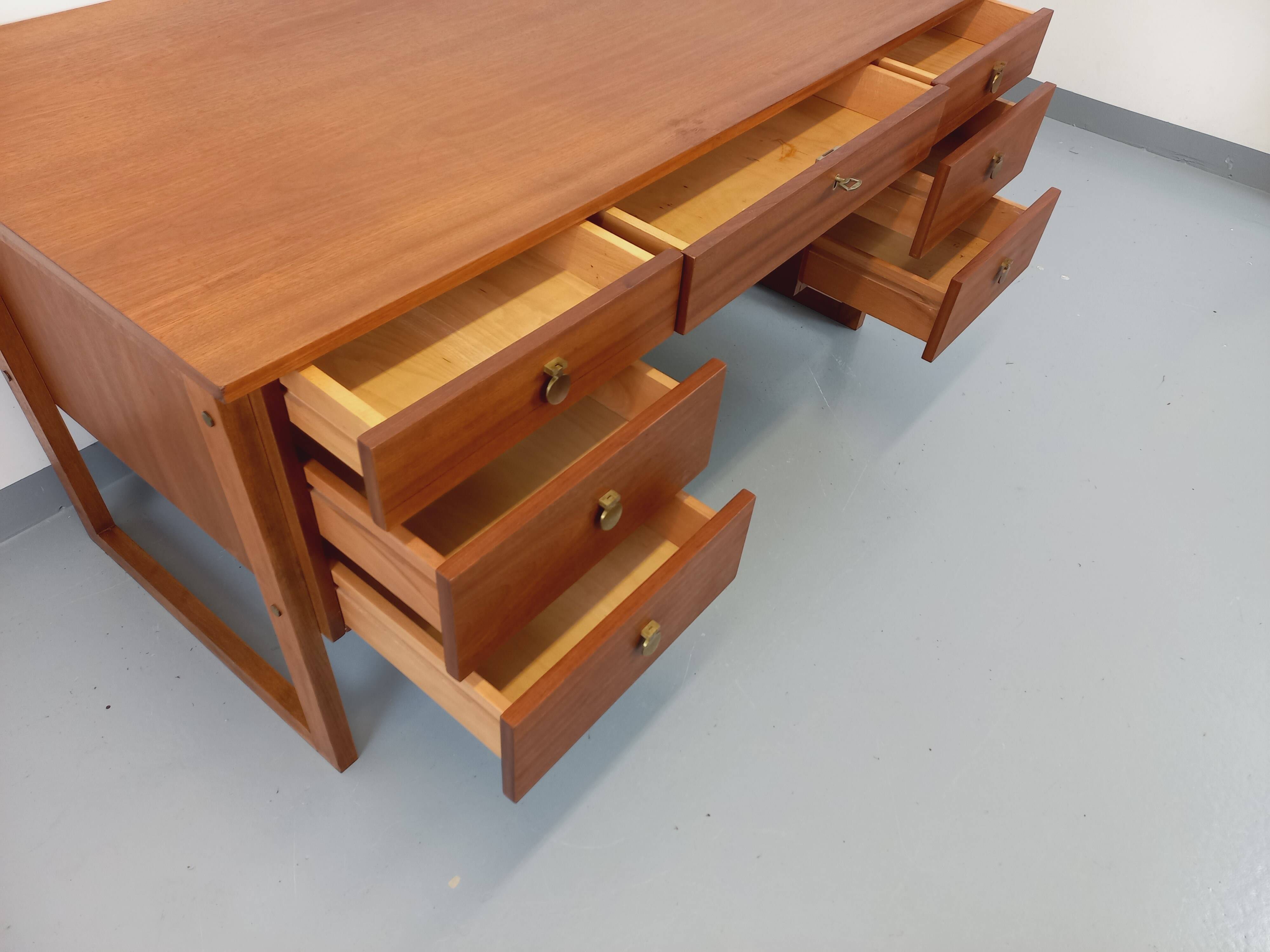 Double-sided executive desk sled legs vintage Scandinavian style in teak from the 60s