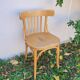 Fauteuil de bistrot pouvant servir de chaise de bureau