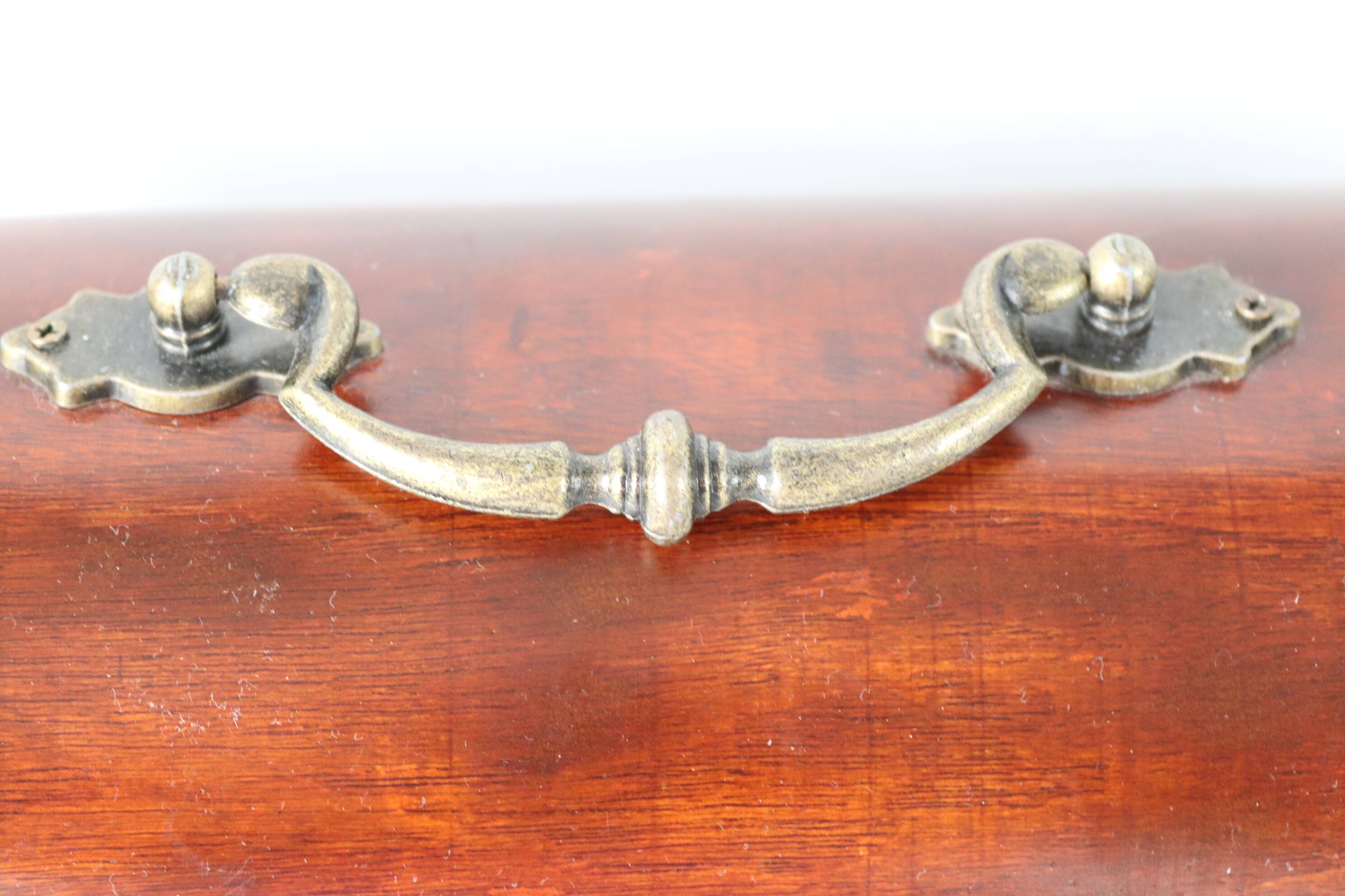 small wooden and brass trunk