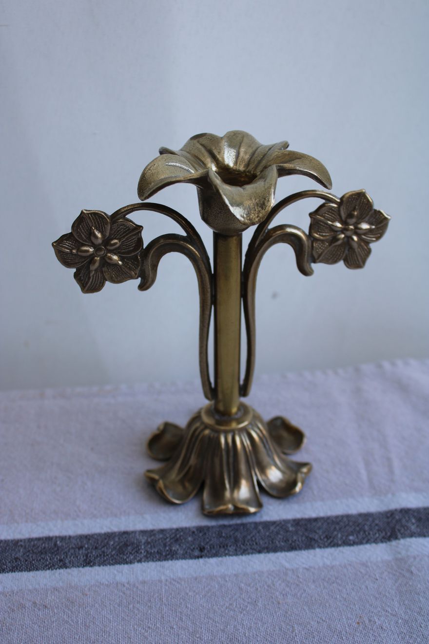 Golden metal stand candle holder