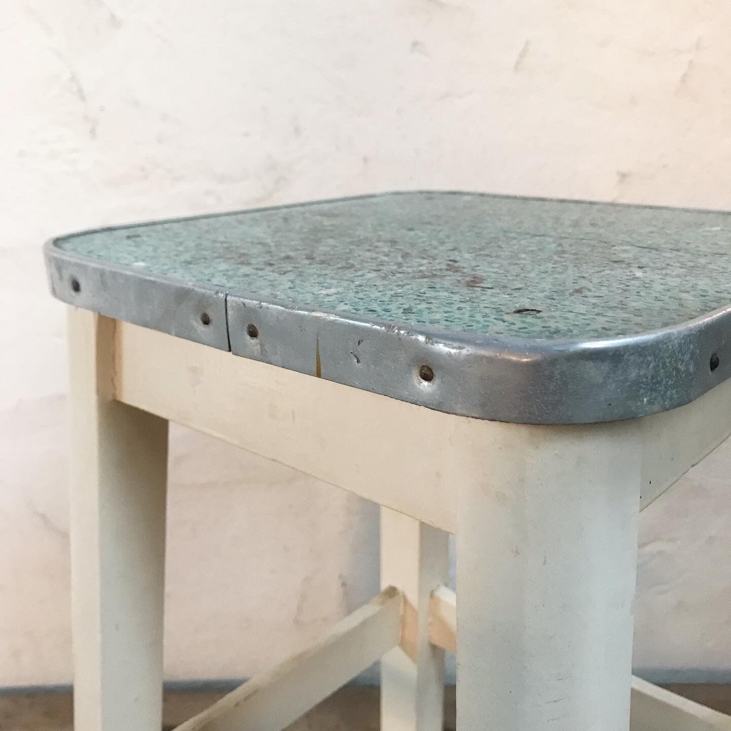 Antique wooden stool and formica