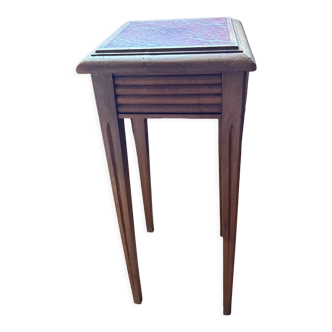Wood plant support and pink marble