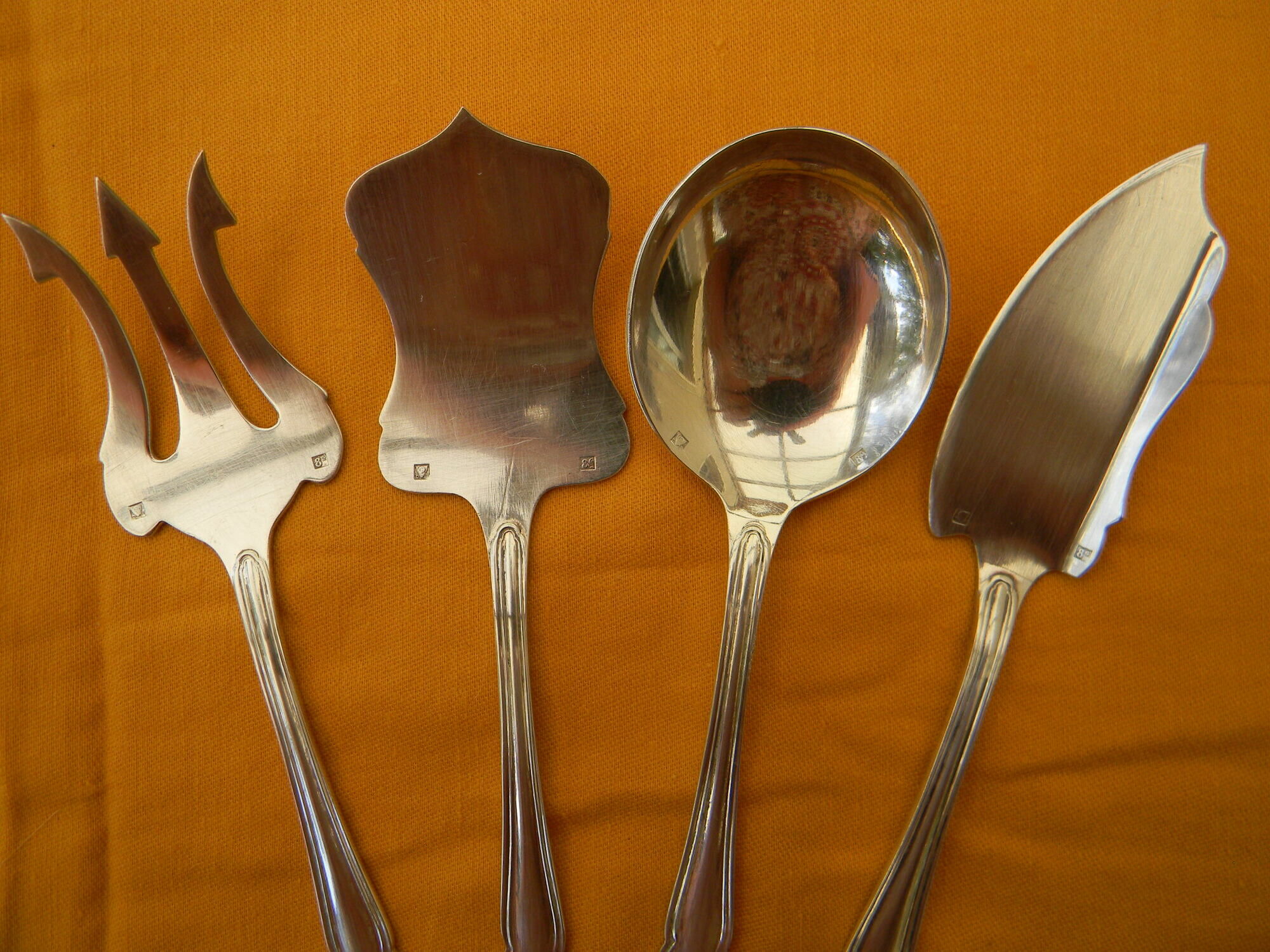 Set of 4 cutlery with silver metal cutlery SAINT MEDARD.