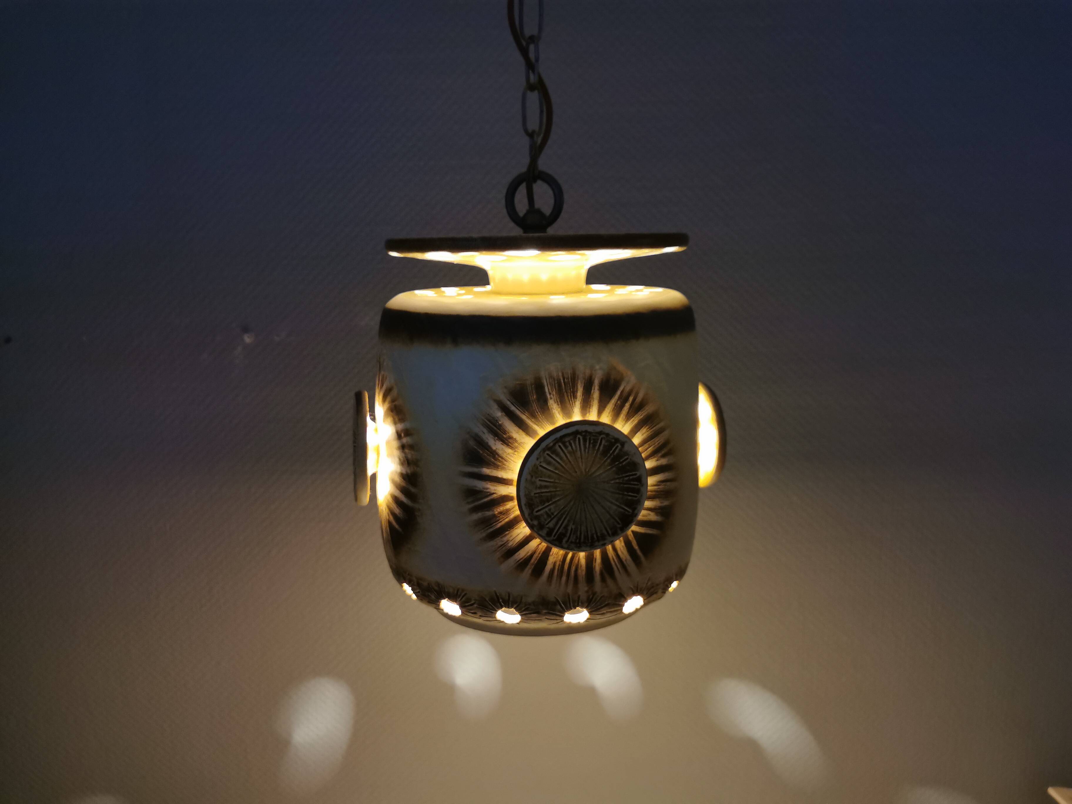 Large and beautiful hanging lamp in ceramic. Danish from the 70s, in super nice condition.