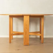 Practical folding table from the 1980s made of light brown pine wood