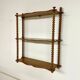Vintage turned wood wall shelf with 3 levels.