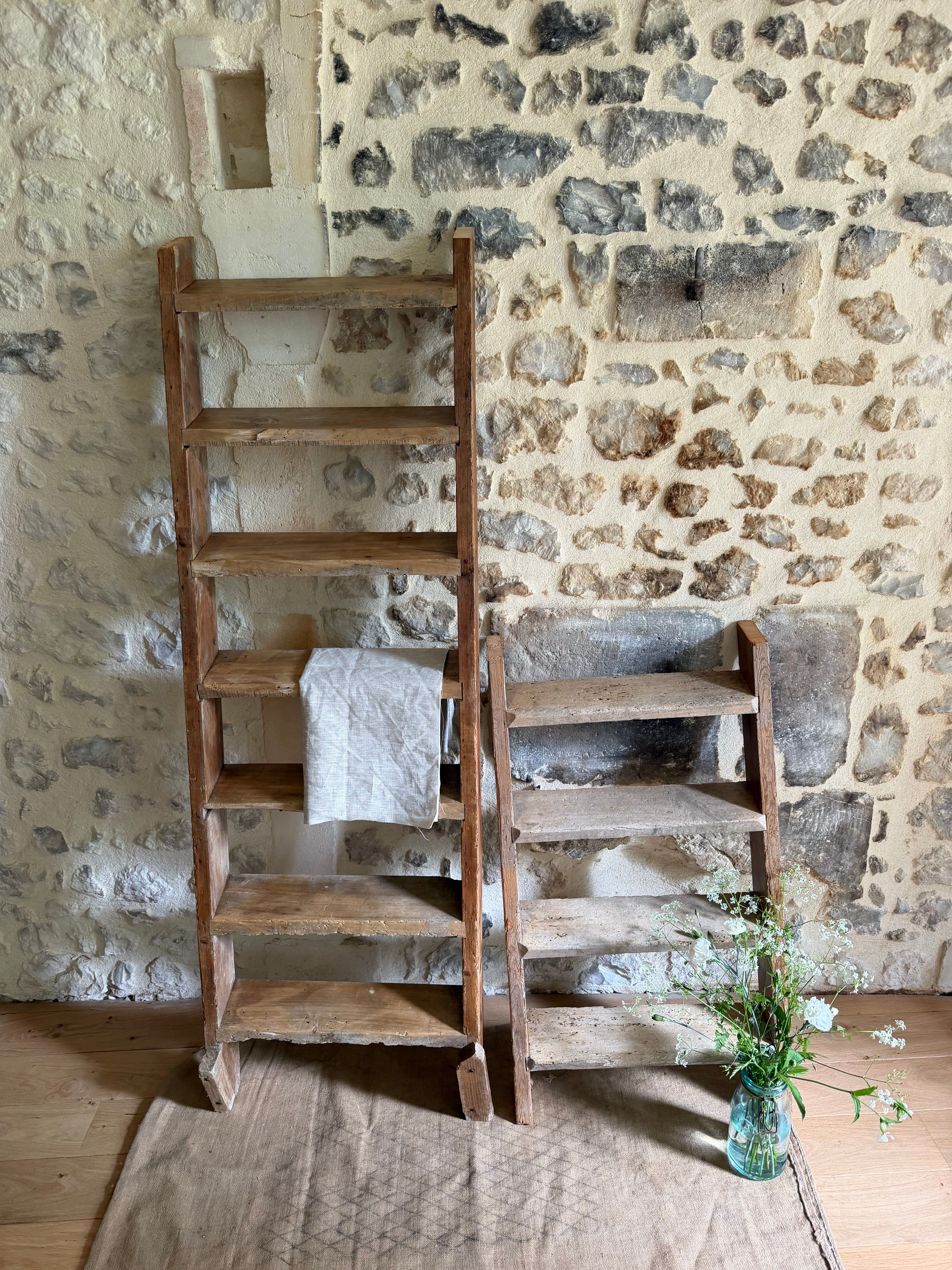 Decorative wooden ladder or towel rack.