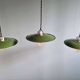 Trio of large industrial suspensions in green enamelled sheet metal.