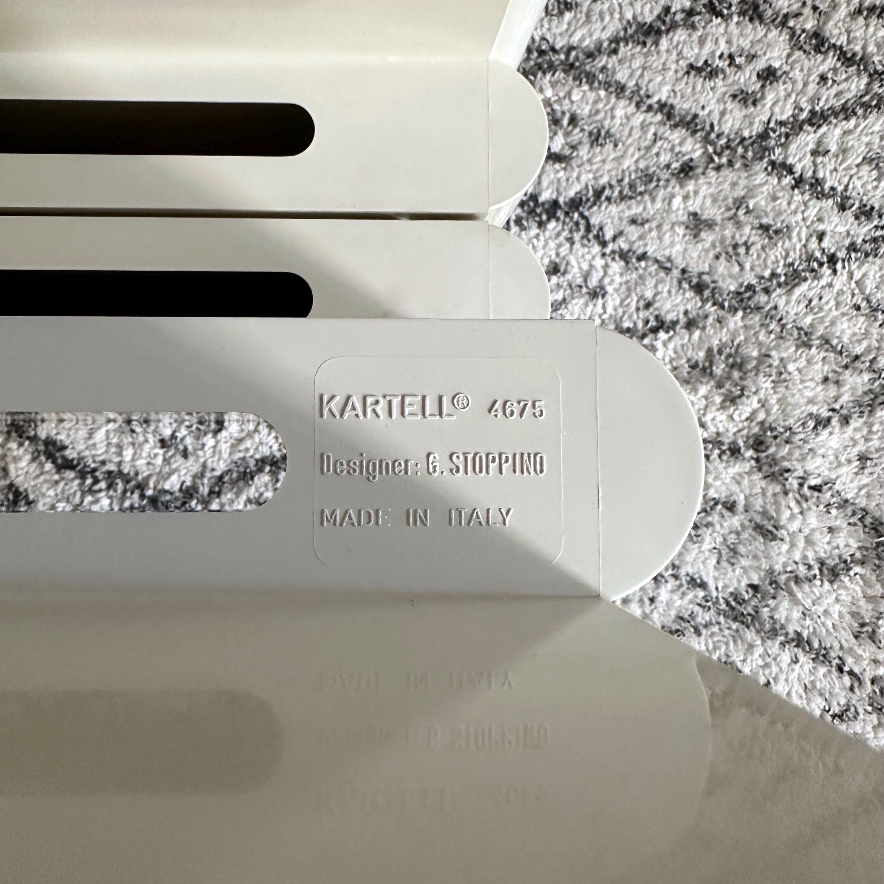 Kartell magazine rack by Giotto Stoppino