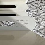 Kartell magazine rack by Giotto Stoppino