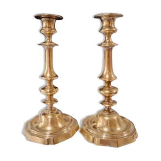 Pair of candle holders with punches