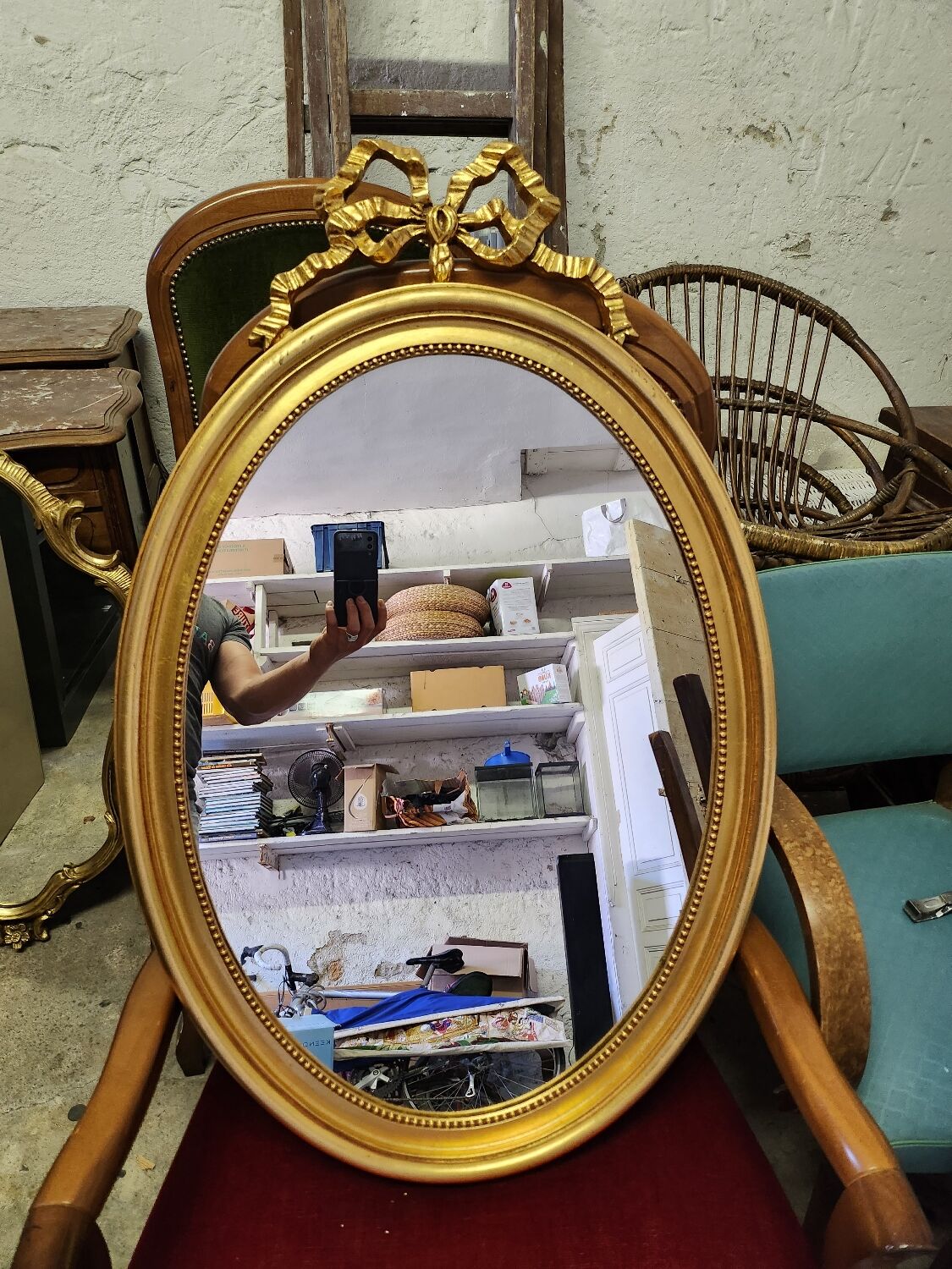 Vintage oval bow tie mirror