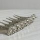 Set of 8 dachshund-shaped knife rests
