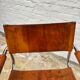 Vintage aluminum tube and tan leather armchair