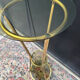 Golden tripod stand with smoked glass from the 1970s.