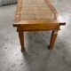 Colonial style teak coffee table - bamboo top under glass