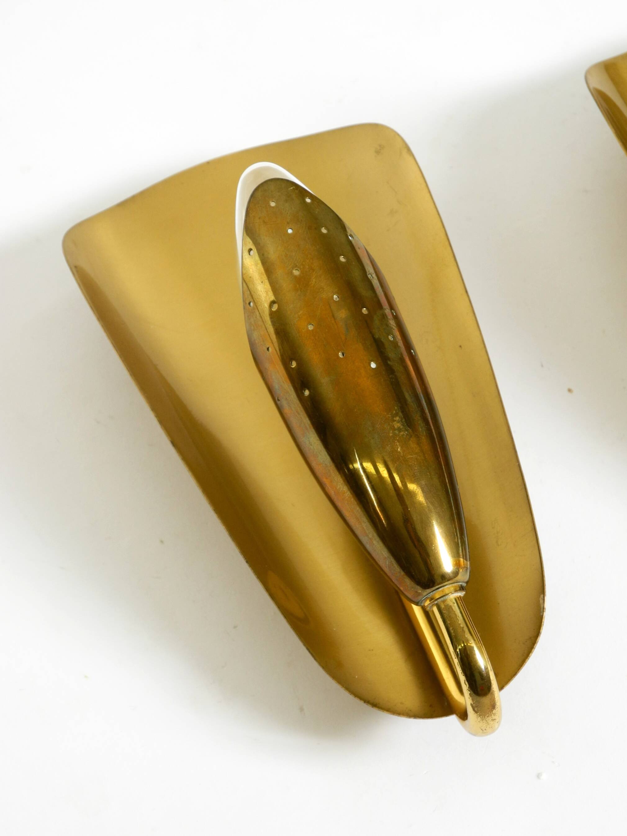 Two enchanting original Swedish Mid Century Modern brass wall lamps