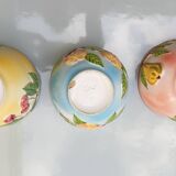 3 slip style bowls signed GV - Cherry, pear and peach patterns.
