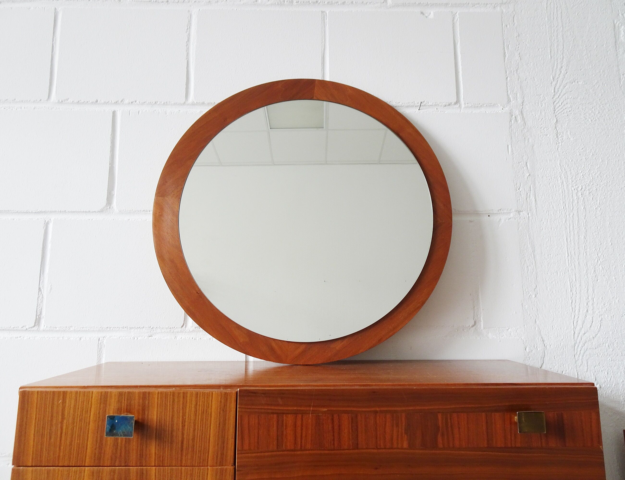round teak mirror