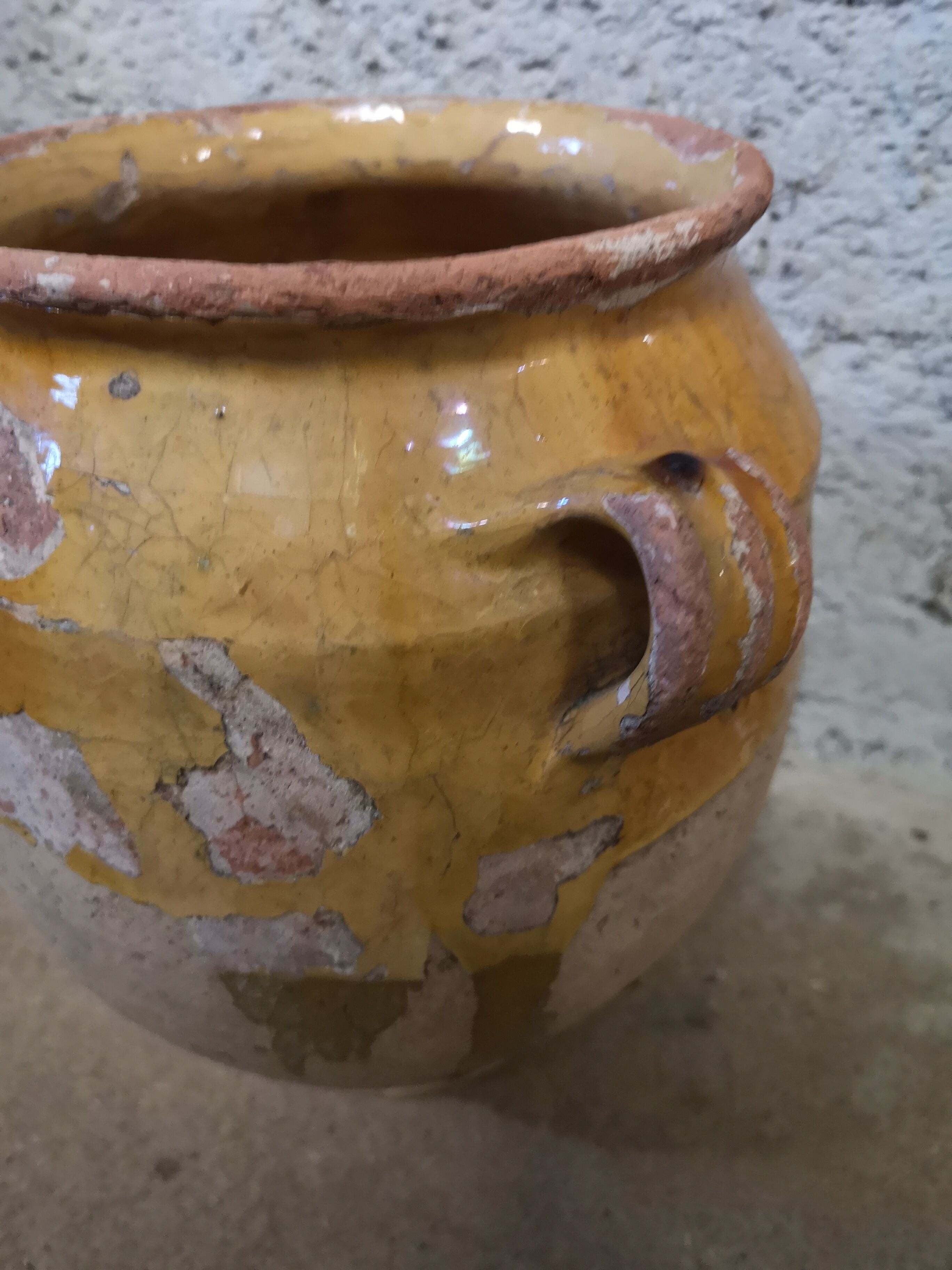 Ancient yellow sandstone pot
