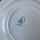 Round vintage plate in earthenware – twisted blue decoration