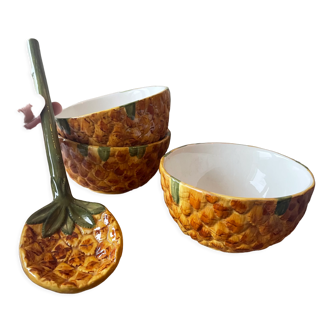 Old set of bowls and spoons in the shape of vintage pineapple