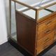 Counter or shop window in oak glass and brass France around 1920