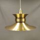 Large hanging lamp, made of brass-coloured aluminium with red and white contrast lacquer inside.
