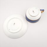 Antique Wedgwood teacup and saucer, bone china. Powder blue and gold English cup and saucer, 1900s