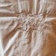 Old monogrammed fabric