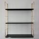 Modular string wall shelf in golden brass and black metal, 50s/60s