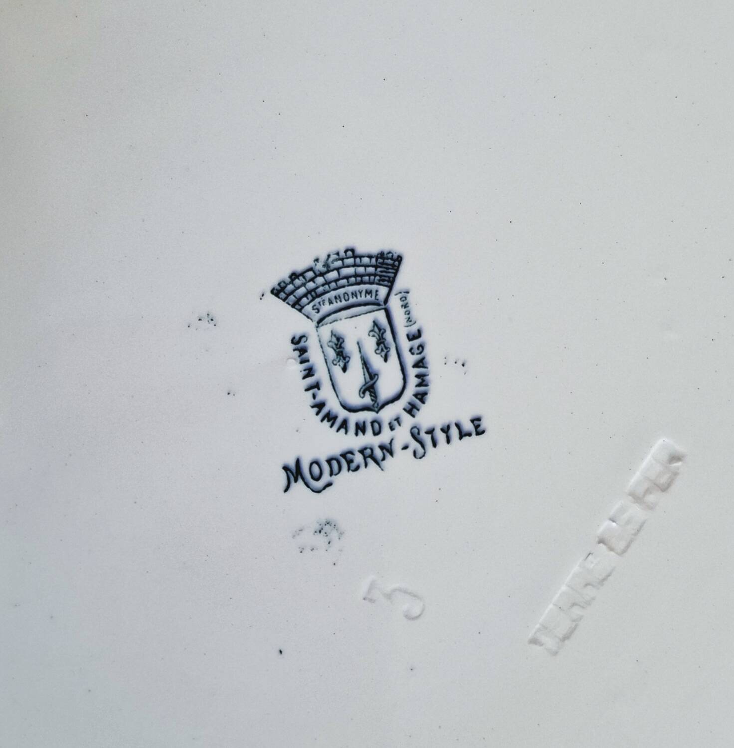 Antique earthenware dessert plates accompanied by a dish