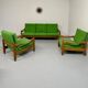 Living room sofa and Scandinavian design armchairs from the 1960s in green boucle.