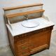 Antique washbasin cabinet in marble and wood