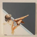 Seated woman painting