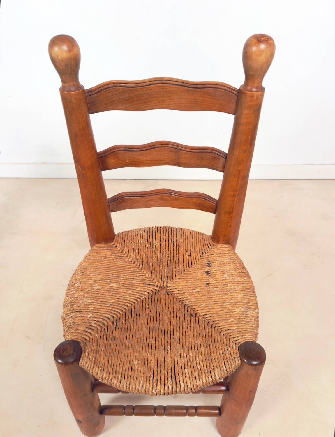 Vintage wooden chair with rush seating